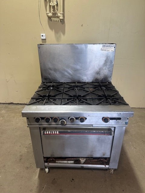 "GARLAND" 6 BURNERS STOVE RANGE WITH OVEN AND BACK SPLASH GUARDS(NATURAL GAS) - Bargains R Ours - #collection_name#