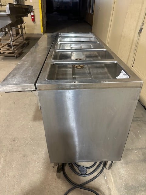 R - S RESTAURANT EQUIPMENT STAINLESS STEEL 5 STEAM HOT WELLS SERVICING LINE TABLE ON CASTERS STORAGE COMPARTMENT SLIDE DOORS FOLD - ABLE LEAF - Bargains R Ours - #collection_name#